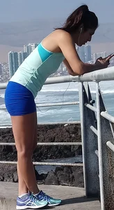 Athletic babe in blue spandex shorts with a nice ass