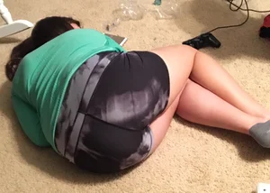 Girlfriend or sister laying down in spandex shorts with a nice ass