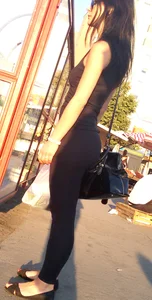 Skinny Candid Girl in Tights and Sandals on the City Street
