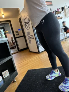 Big ass girl In tights at cafe