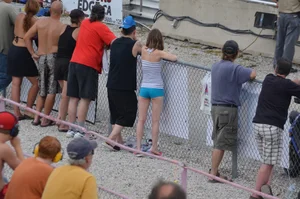 Skinny babe with a cute little ass in tiny blue shorts