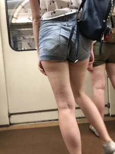 Cute And Slightly Awkward Tall Teen Girl in a Top and Denim Shorts Subway Train Candid Photos