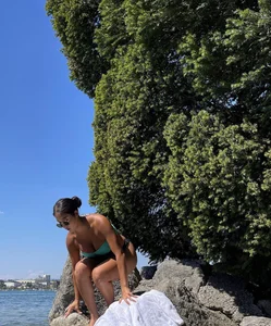 Sexy Girl Wearing Sunglasses and a Swimsuit Beach Creepshot