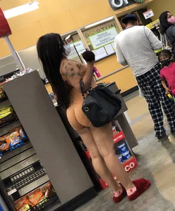 Latina with hard nipples and a big booty in tight spandex shorts outfit
