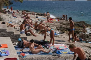 Nude girls on a beach in Hvar, Croatia