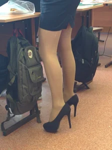 Gorgeous Thin Legs on Stiletto Heels Closeup Creepshot in College Classroom