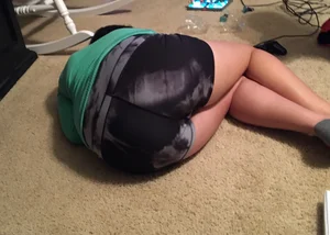 Girlfriend or sister laying down in spandex shorts with a nice ass