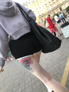 A Tall And Slim Candid Girl in Spandex Shorts in a Hoodie Top, With Tattoos on Her Long Legs Subway Creepshots