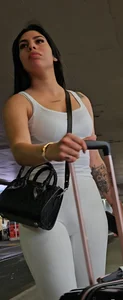Megapost: Beautiful M.E in ALL white outfit vaping. (GIF)
