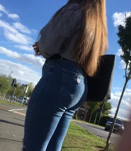 Long haired beauty teen with a tight ass in jeans
