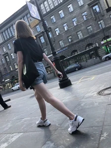 Candid Teen in Denim Shorts And Sneakers With Slim Legs Street Photos