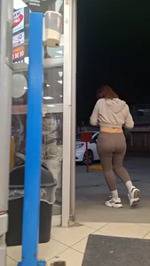 Latina jiggle big butt in brown leggings