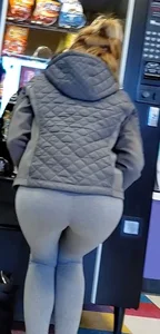 Girl with a great ass in tight grey leggings
