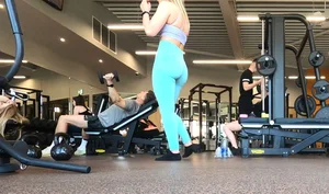 Gym blonde in turquoise leggings notices me and doesn’t mind, even moves in front of me later for some close-ups