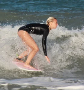 Hot surfer chicks out in the water