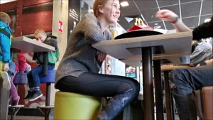Adorable blonde teen in leggings at McDonald's