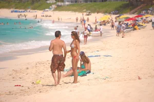 Bunch of sexy girls and milfs in bikinis at the beach