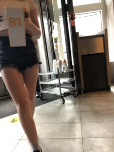 Cute Teen Girl in Mini-Shorts Walking into a Cafe Legs And Booty Closeups