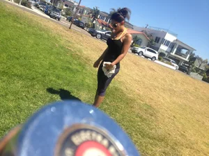 Hot brunette babe in leggings walking her dog with a nice ass and some cleavage