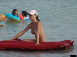 A bunch of sexy beach voyeur babes in bikinis, thongs and topless