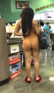 Latina with hard nipples and a big booty in tight spandex shorts outfit