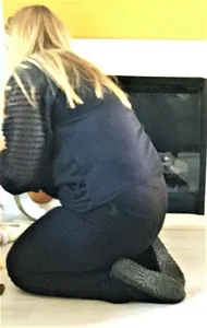Chubby Mom in Leggings Sitting on the Floor Photos