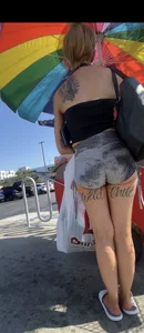 Milf with cheeks out and “Wild” tattoo