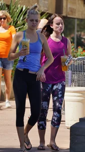 Sexy blonde and friend walking in leggings