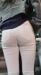White jeans on escalator