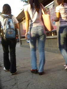 Cute Asian girl with a nice booty in tight jeans