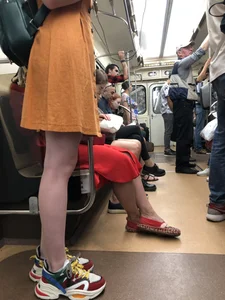 Cute Teen Girl in a Dress With Slim Legs Standing in the Subway Train, Then Crossing the Street Photo Gallery