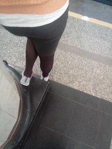 Booty in a Skirt and Legs in Pantyhose Subway Station Closeup Photo