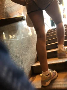 Teen in Denim Shorts Walking up the Stairs Closeup Creepshots