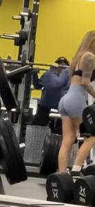 Petite blonde with bubble butt in blue spandex shorts