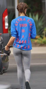 Hot college girl getting food in grey leggings