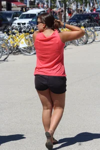Thick girl in pink top and black shorts with vpl