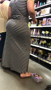 Beautiful Latina with amazing body in long dress