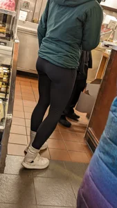 Tight legs and ass in black legging. Bend over