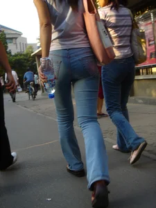 Cute Asian girl with a nice booty in tight jeans