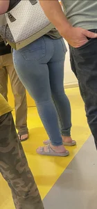 Thick brunette filling out jeans at Lego Store