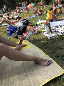 Sexy Girl in Swimsuit Sitting on a Beach With Her Phone Creepshots Gallery