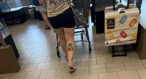 Milf in black biker shorts and flip flops