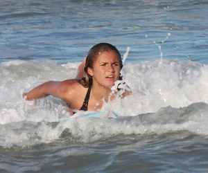 Hot surfer chicks out in the water
