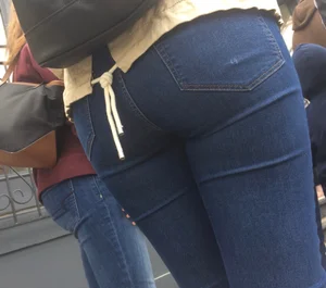 2 nice asses in tight jeans standing around