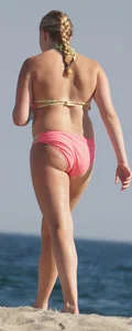 Thick blonde bikini babe on the beach