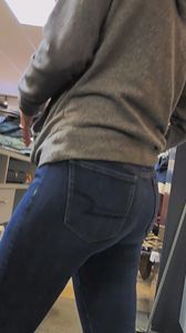 Store worker in jeans