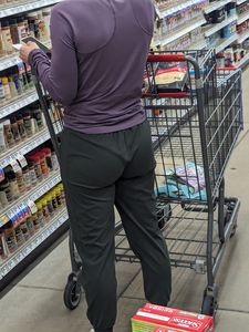 Milf with slight wedgie showing