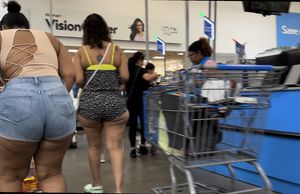 Walmart Chick can’t contain her phat ass