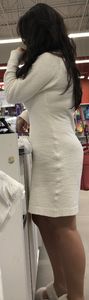 Busty brunette beauty in a fuzzy dress