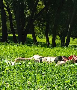 Milf laying on the grass in the park, cameltoe creepshots